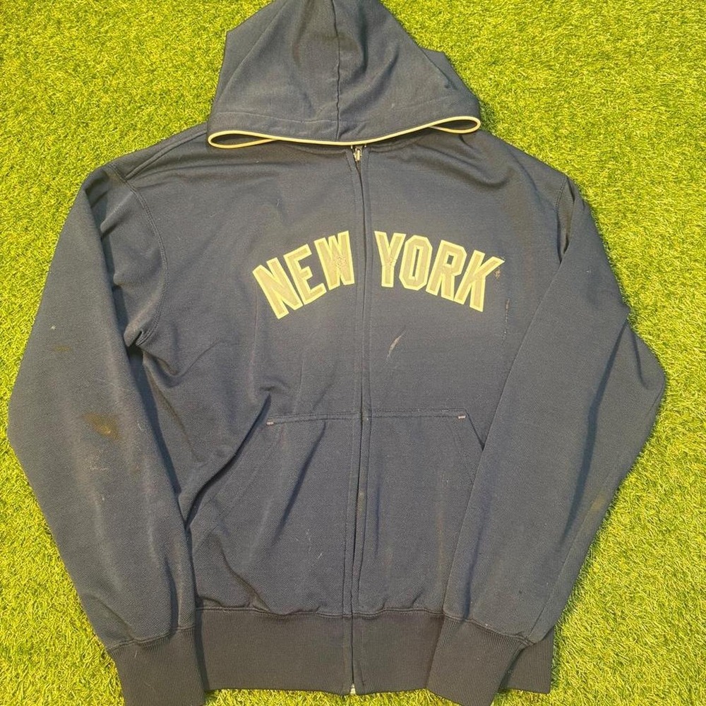 Majestic Athletic New York Yankees navy blue zip-up hoodie with yellow